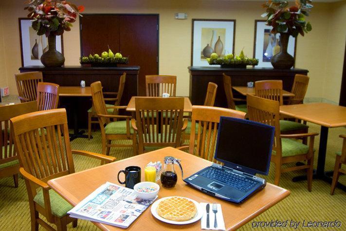 提加波特兰希尔顿逸林酒店 泰格德 餐厅 照片